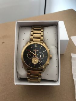 Gold Nixon watch women