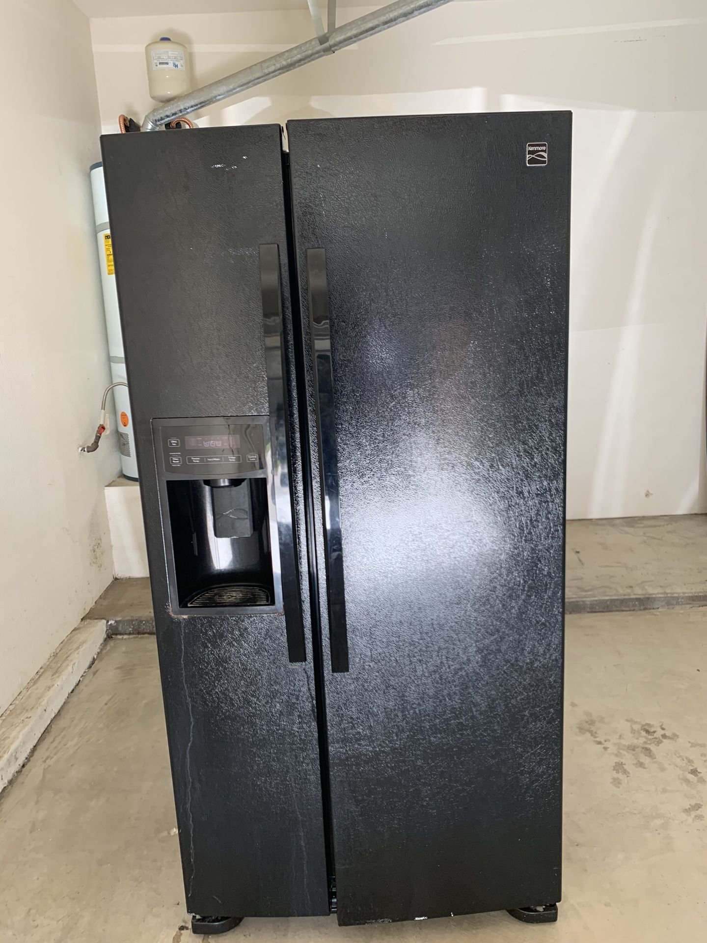 Black Kenmore side by side refrigerator