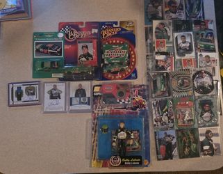 Bobby Labonte lot. Autographs, uniform fabric, rubber from tire, action figure, cars, 45 trade cards
