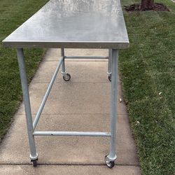 Stainless Steel Table With Wheels  6 Ft Long 2 Ft 6 Inch Wide 3 Ft  5 1/2 Inch Height 