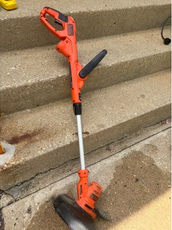 Electric grass edge trimmer