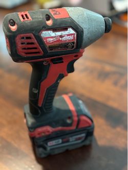Milwaukee M18 Impact Driver w/ XC5.0 Battery