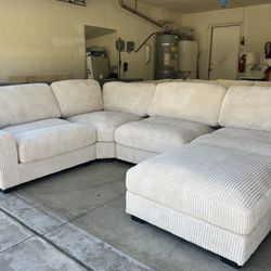 Ivory Corduroy Couch 127” By 90”