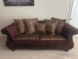 Traditional Carved Wood Trim Sofa with Throw Pillows and Pull Out Twin Bed