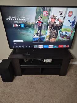 Tv de 55" LG con mesa y barra de sonido (with Table and sound bar)