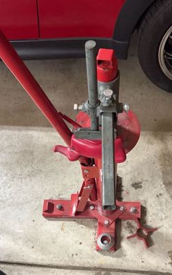 Manual tire changer with duckhead attachment