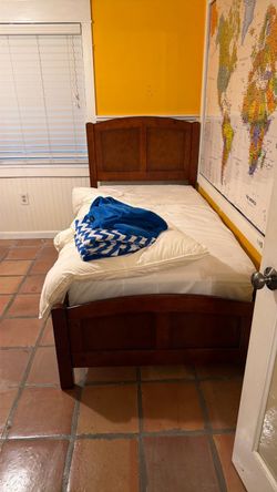 TWO twin wooden beds