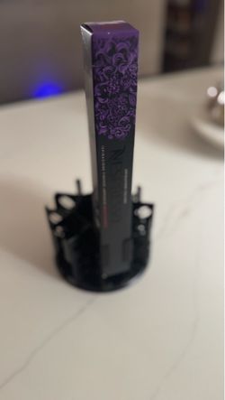 Nespresso with extra water reserve and coffee pod holder