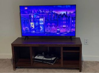 Tv, stand, and ps5