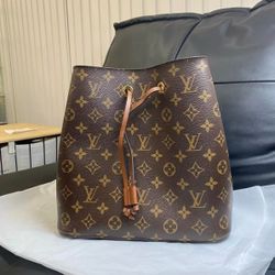 Louis Vuitton brown water bucket
