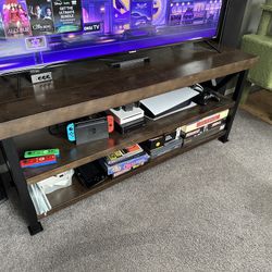 Black and brown tv stand