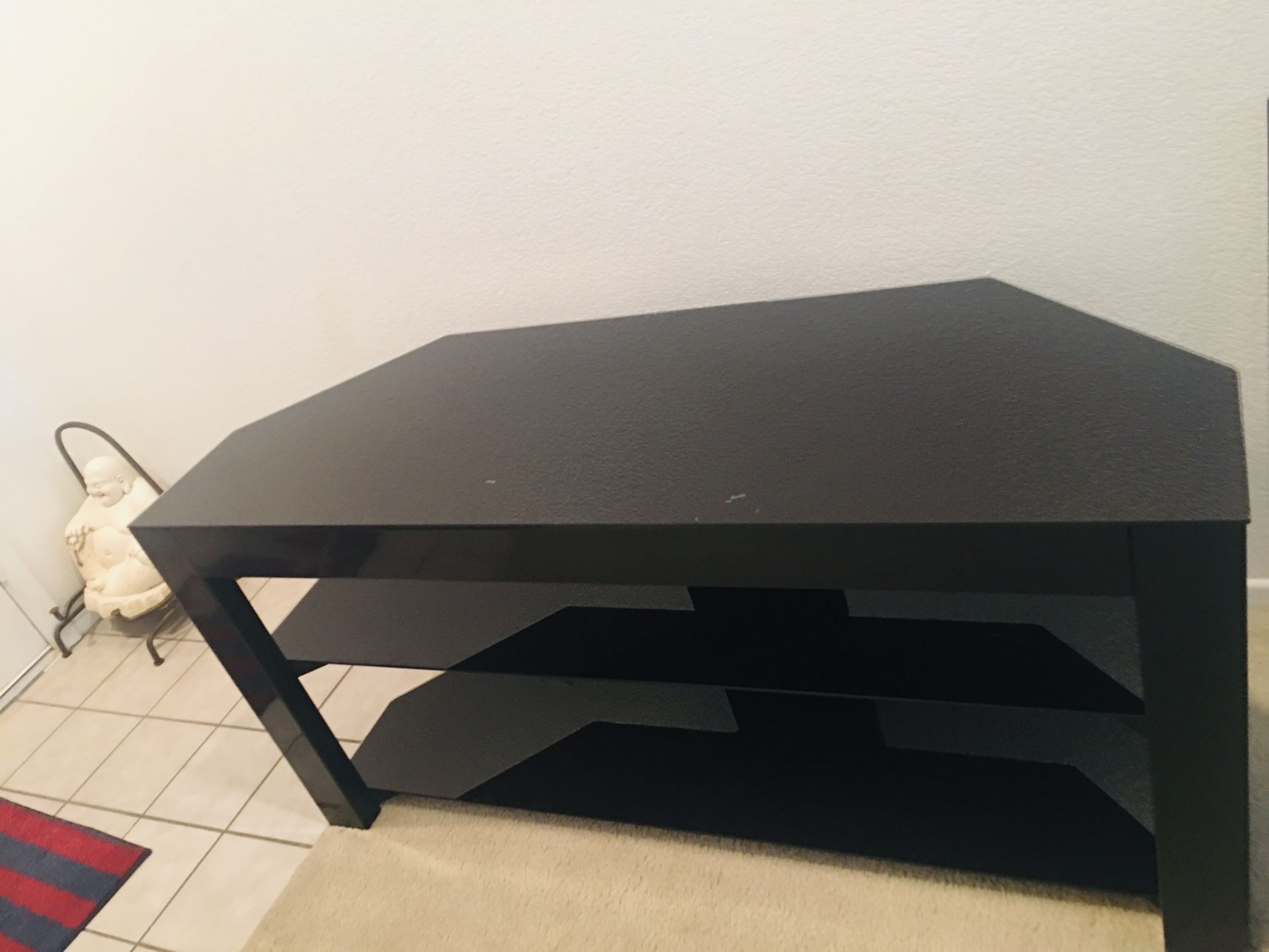 Black color metal & glass top tv stand exellent condition $50.00