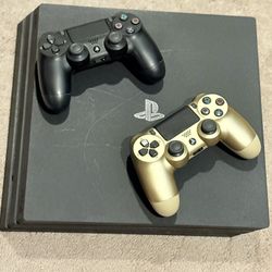 PS4 Pro (1 TB) - comes with 2 controllers 