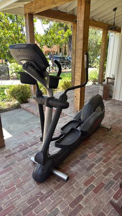 Life fitness elliptical - used - works - some body damage