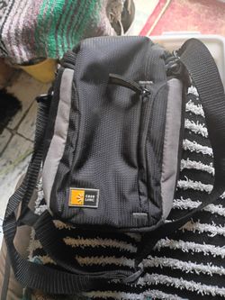 A Black Tote Bag w/ a lot of Pockets