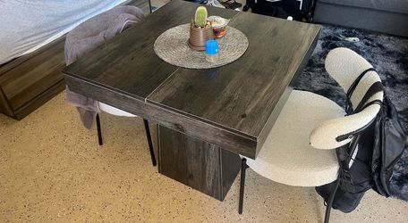 Cute square table and two comfy chairs