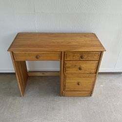 Kids desk. In great shape. All solid wood - no particle board. Dimensions are 23" x 45" 