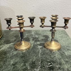 Pair of brass candle holders, 5” tall, each can hold 5 candles 