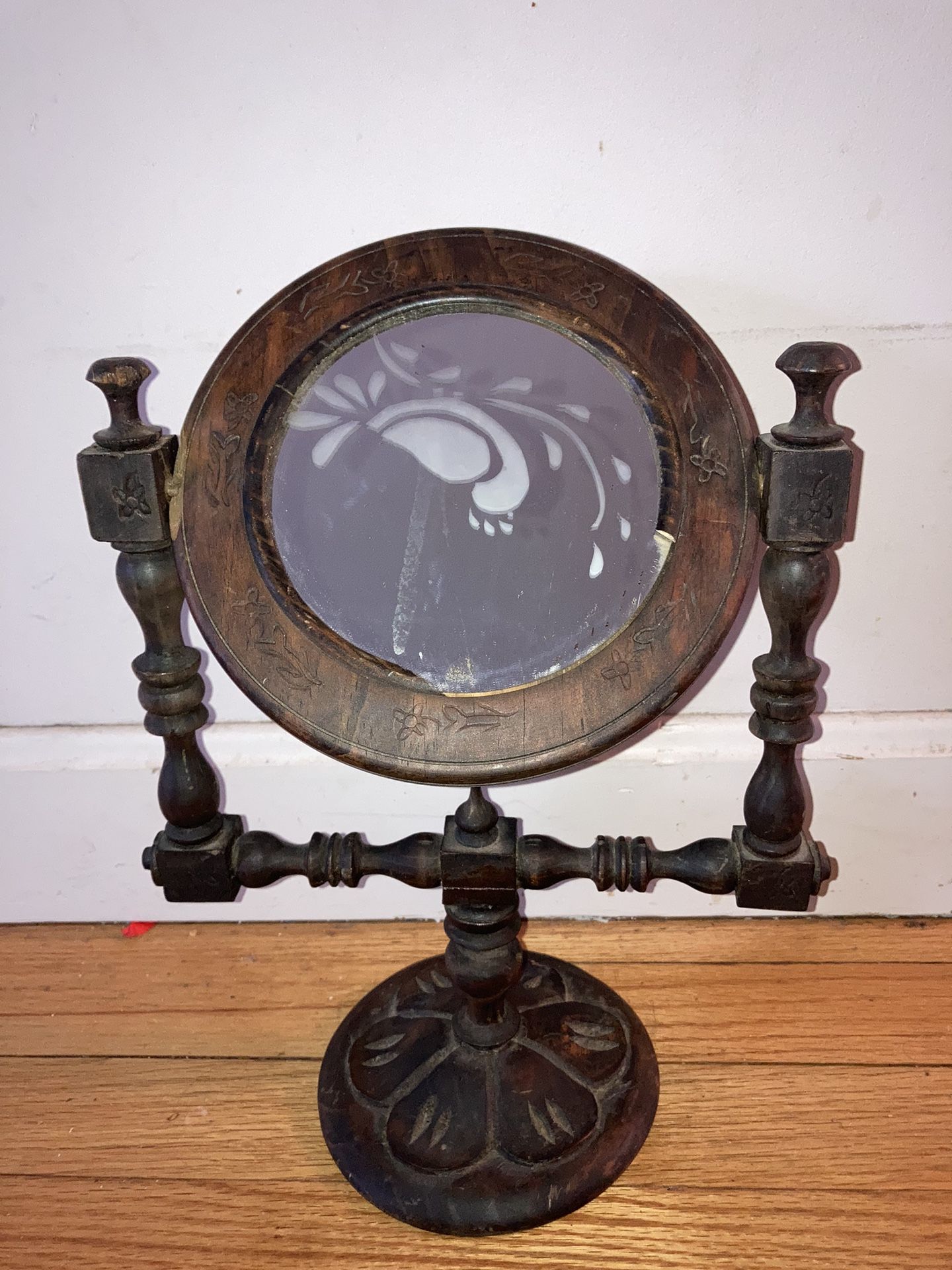 Antique pedestal, shaving mirror.