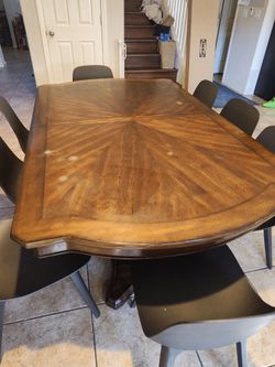 Dining table with two leaves