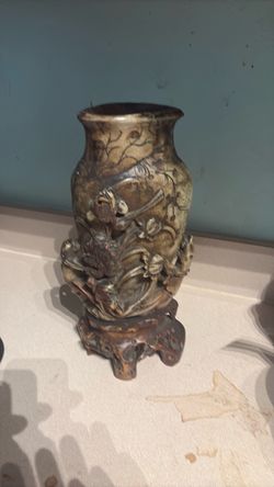 Carved Stone Vase with Decorative Base