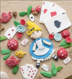 Alice in wonderland down to rabbit hile tea party fondant wilton cake topper