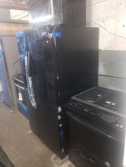 whirlpool set black new open box stove fridge and microwave