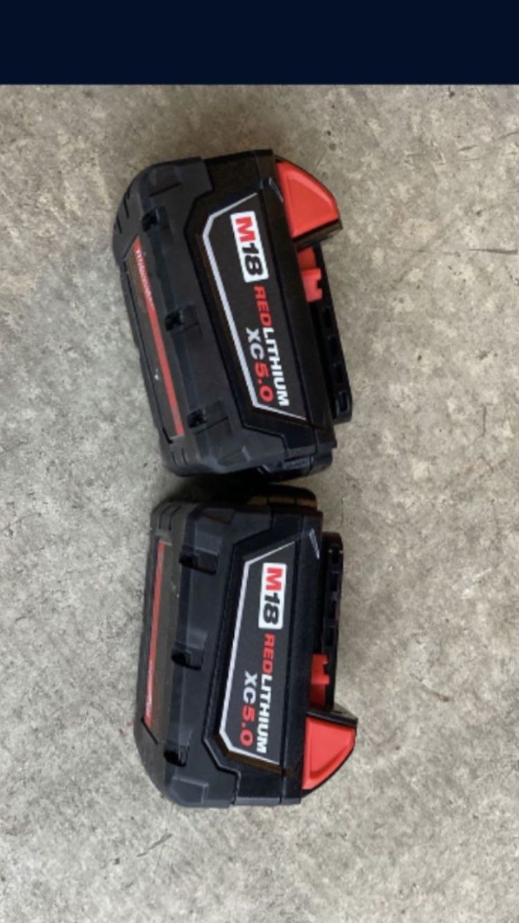 2 New Milwaukee M18 5.0 AH Batteries 