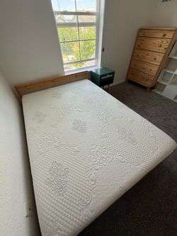 Bed frame, mattress, dresser, and night table