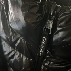 mens size M calvin Klein shiny puffer. 