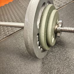 6 ft Steel Bar [ Split into two pieces] with Beautiful CAP Cast Iron Plates as good as NEW. Brute W: 100#