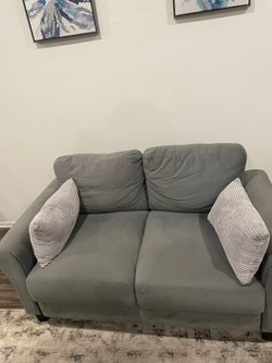Grey loveseat couch. Great condition!