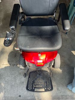 Electric wheelchair for a disabled