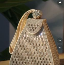 Gold or silver hand bag