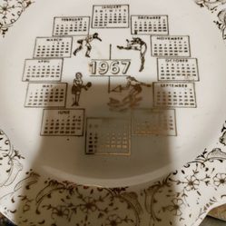 Vintage 1967 Calendar 9 Inch Plate Sports Football,Ski,Basketball, Tennis.       Gold  