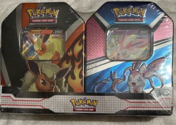2023 POKEMON FLAREON V & SYLVEON V TINS WITH EVOLVING SKIES BOOSTER PACKS