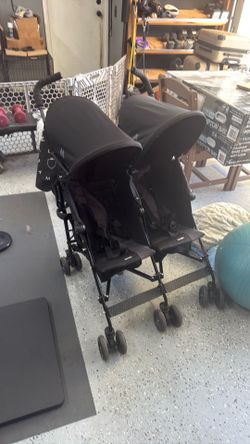 Dual seat umbrella stroller