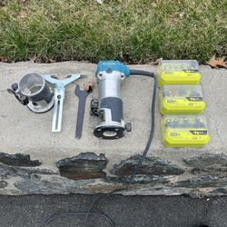 Makita Router with (3) Ryobi Router Bit Sets