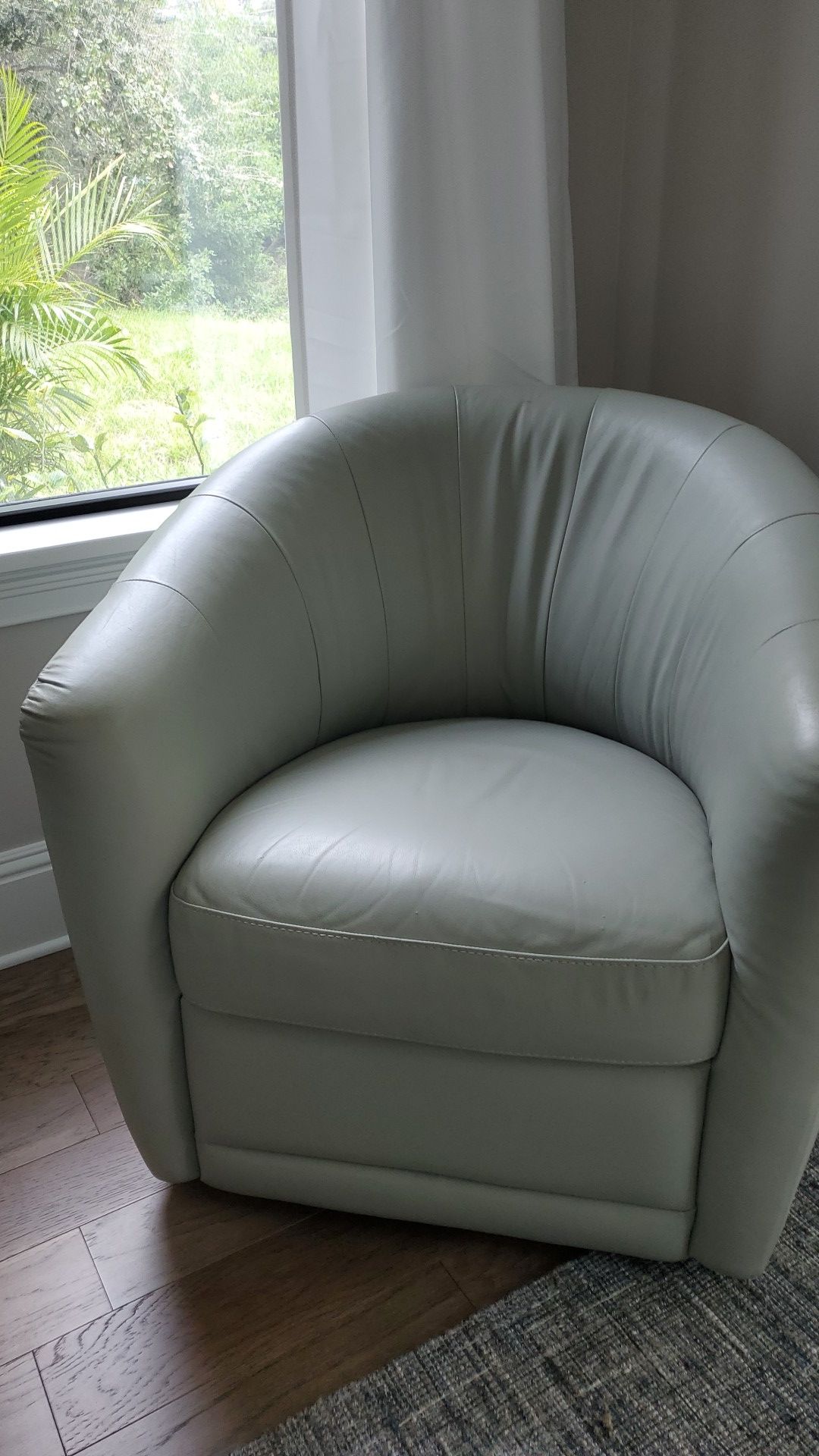 Natuzzi leather barrel chair, pastel jade