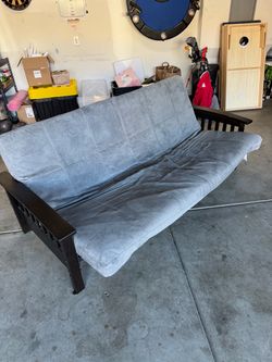 Grey Futon Couch with wood arms