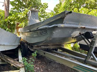 21 foot Carolina skiff and three axle trailer