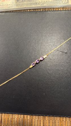 14k Yellow Gold Amethyst Three Stone Bracelet. 