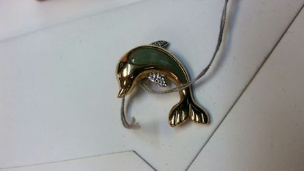 14 kt jade charm.