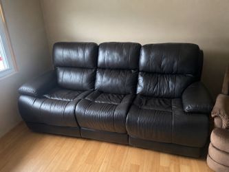 Leather sofa recliner