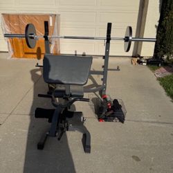 Bench Press W/ Barbell and plates and adjustable dumbbells 