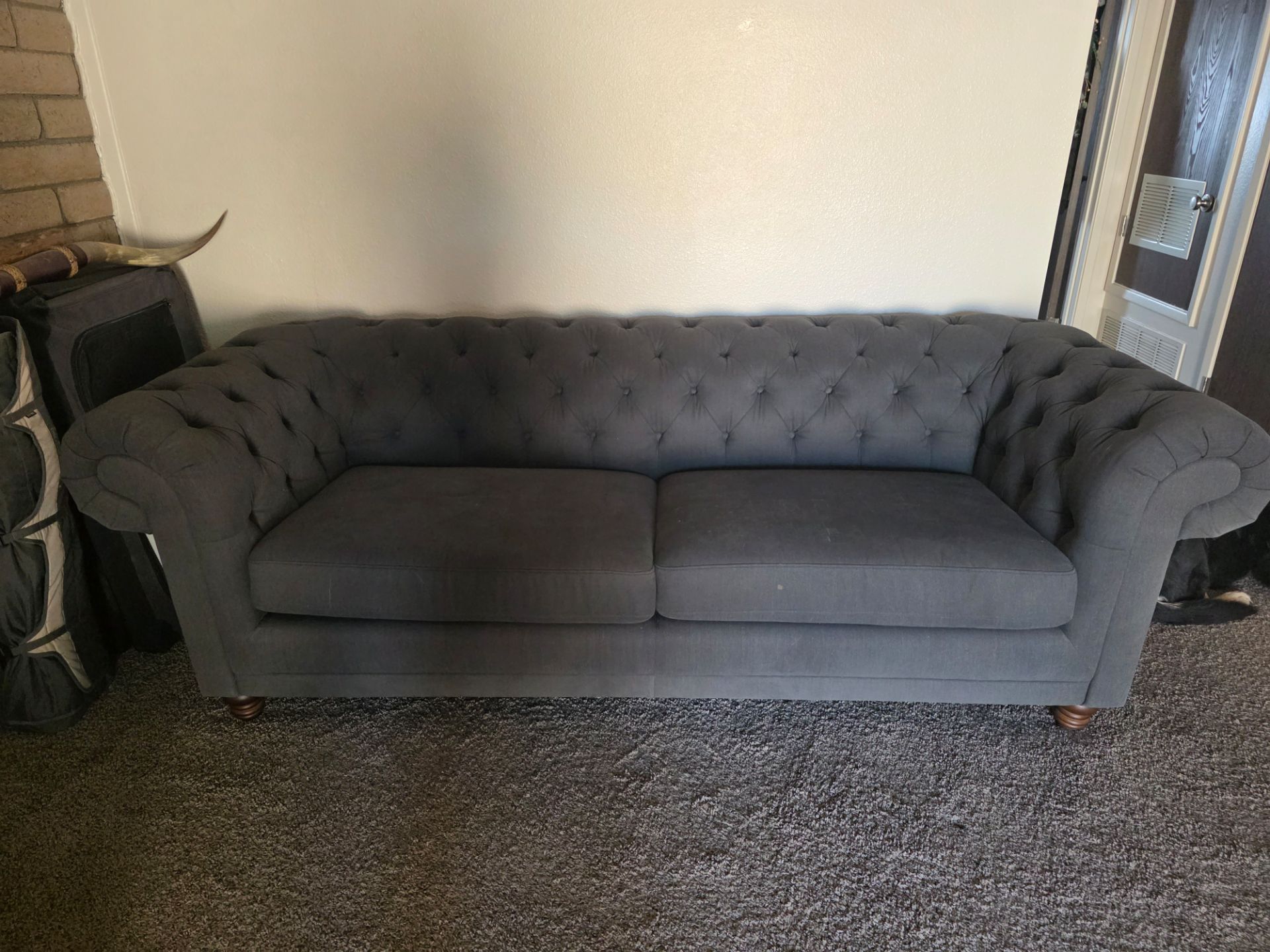 Dark Chesterfield couch