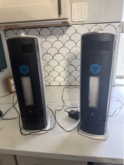 2 air purifiers. Covers 1000 ft.² each.