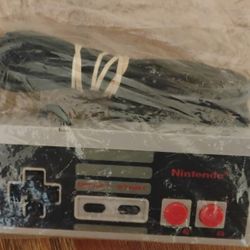 Nintendo NES-004 corded controller for the Nintendo NES