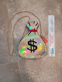 NEW... Vinyl purse hard shells with zipper and adjustable chain handle. It still has its tags Cash only please