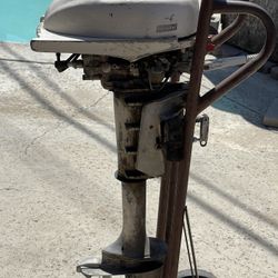 Antique Classic Evinrude outboard motor/ With Stand